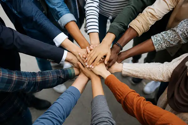 Community hands joined together